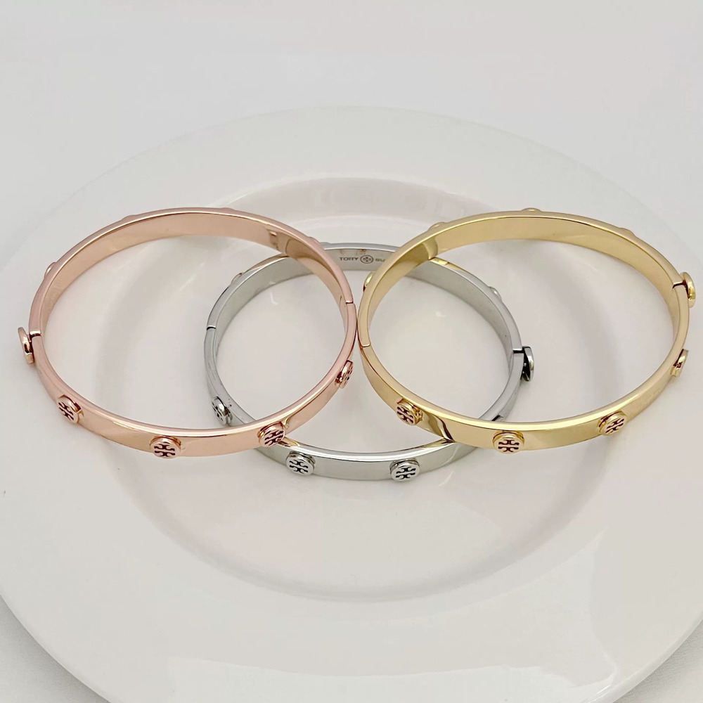 Tory Burch Gold Plated Embossed Metal Bracelet